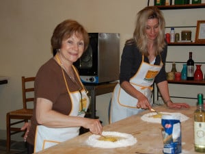Hands-on cooking action in one of our Florence cooking classes