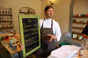Italian Chef with the Florence cooking class's menu